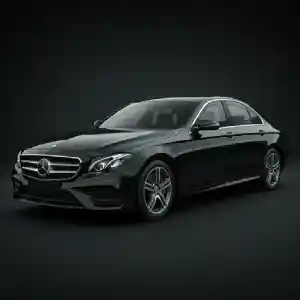 A black Mercedes-Benz E-Class sedan parked on a dark background.