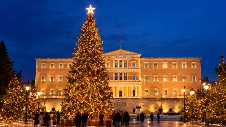 Illuminated Christmas tree in front of the Greek Parliament building at Syntagma Square, Athens